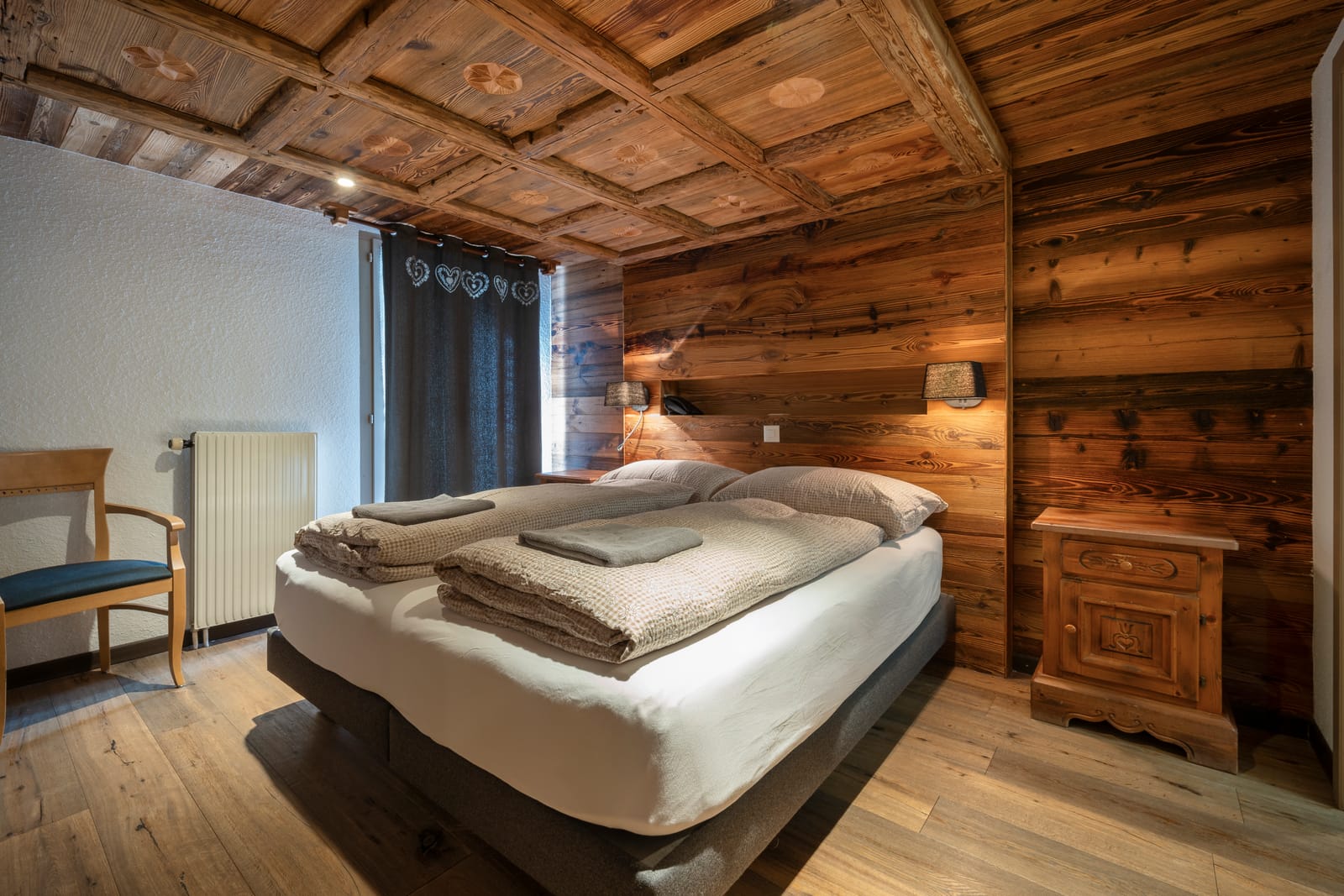 Chambre confortable du Grand Chalet à Leysin